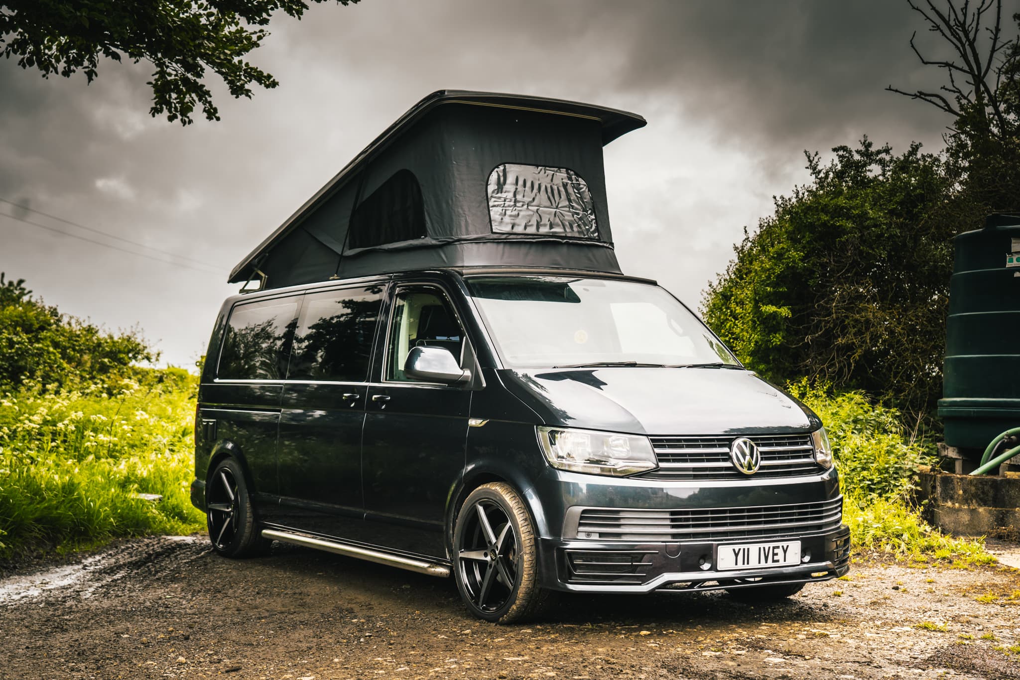 VW T6 in Midnight Starlight Blue - DSG Off Grid with Pop Top - with Inflatable Awning - 1st June